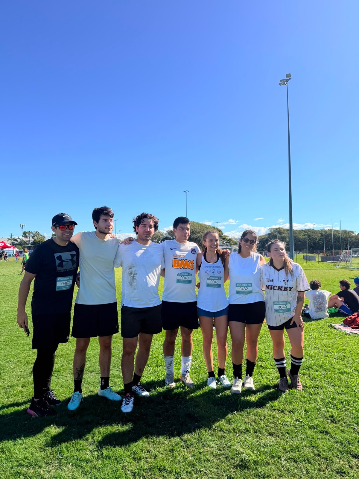 A group of Warriors members smiling together at ACTIVATE Brisbane