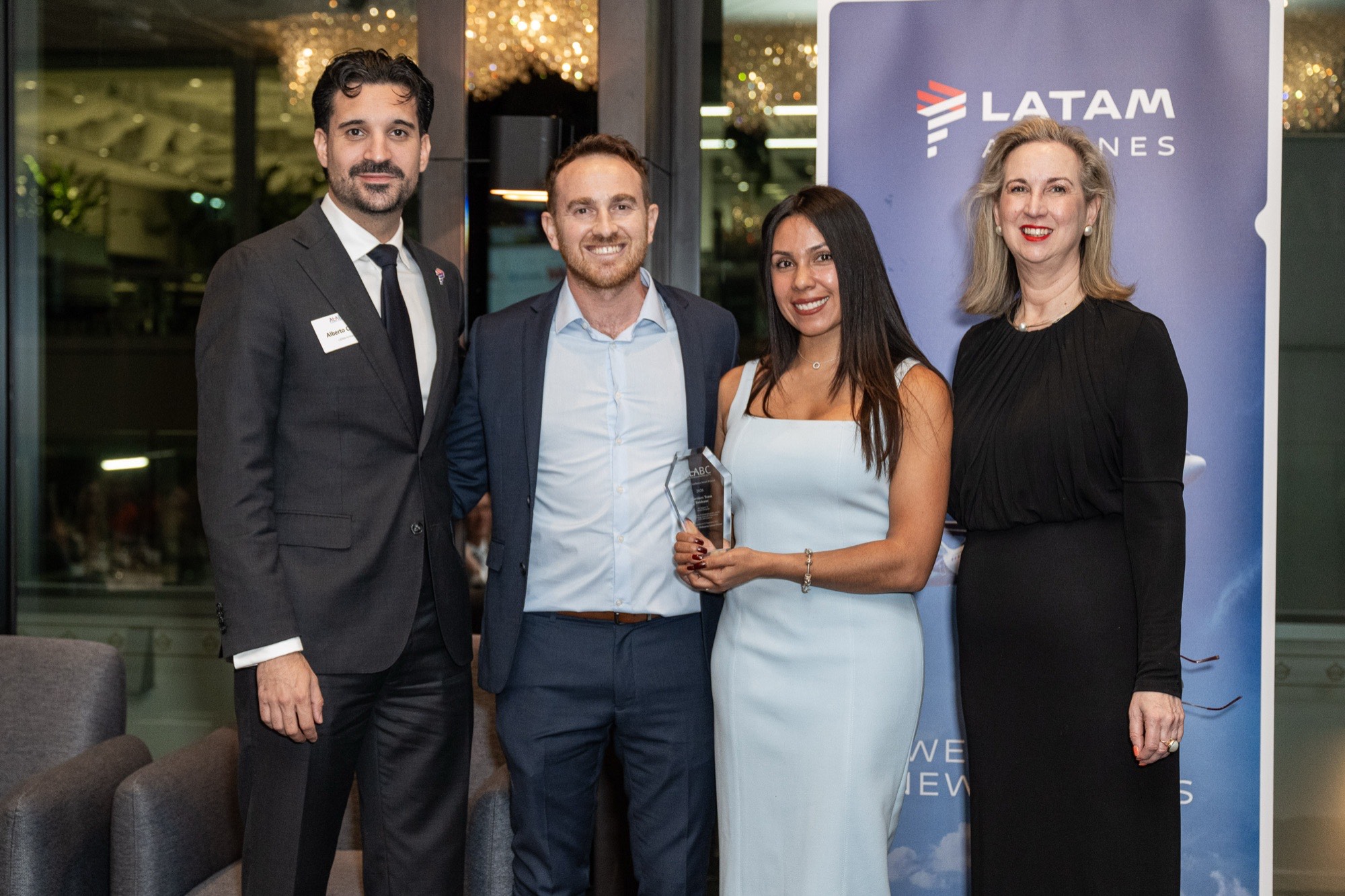 Warriors representatives receiving the ALABC Business Excellence Award in Melbourne
