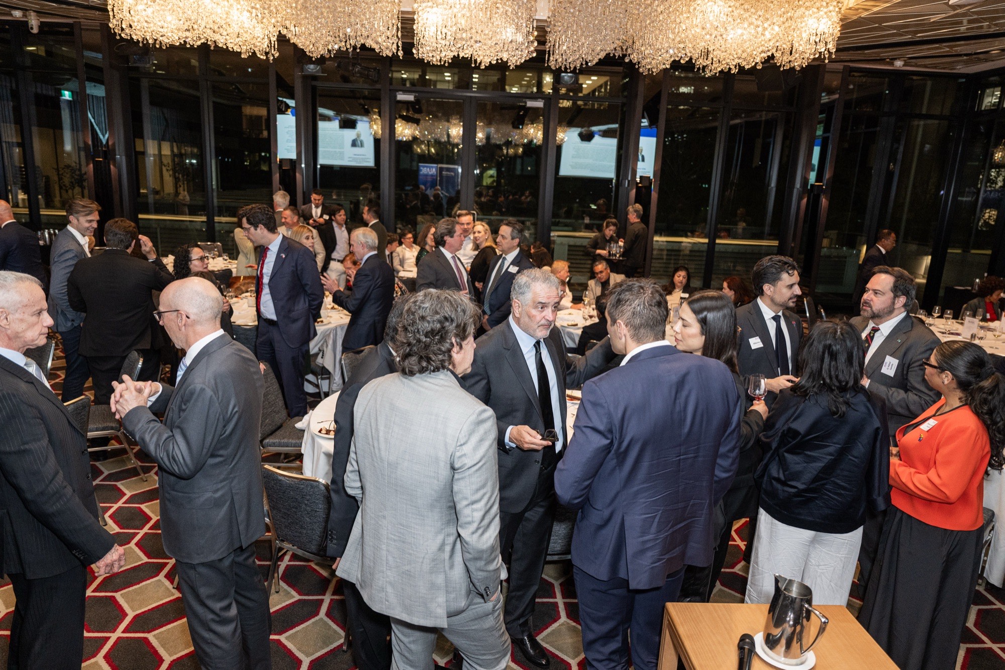 Guests raising a toast at a table during the ALABC Melbourne Annual Dinner
